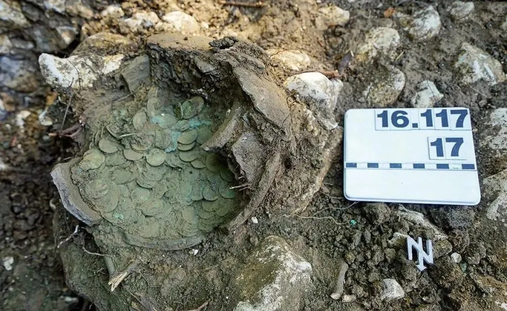 1290 Roman coin with a piece of cowhide; Switzerland